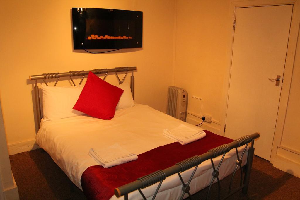 London Olympus Hotel Nirvana Quarto foto