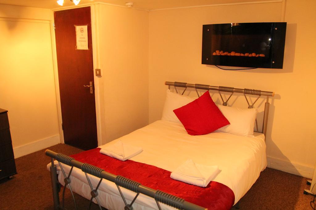 London Olympus Hotel Nirvana Quarto foto