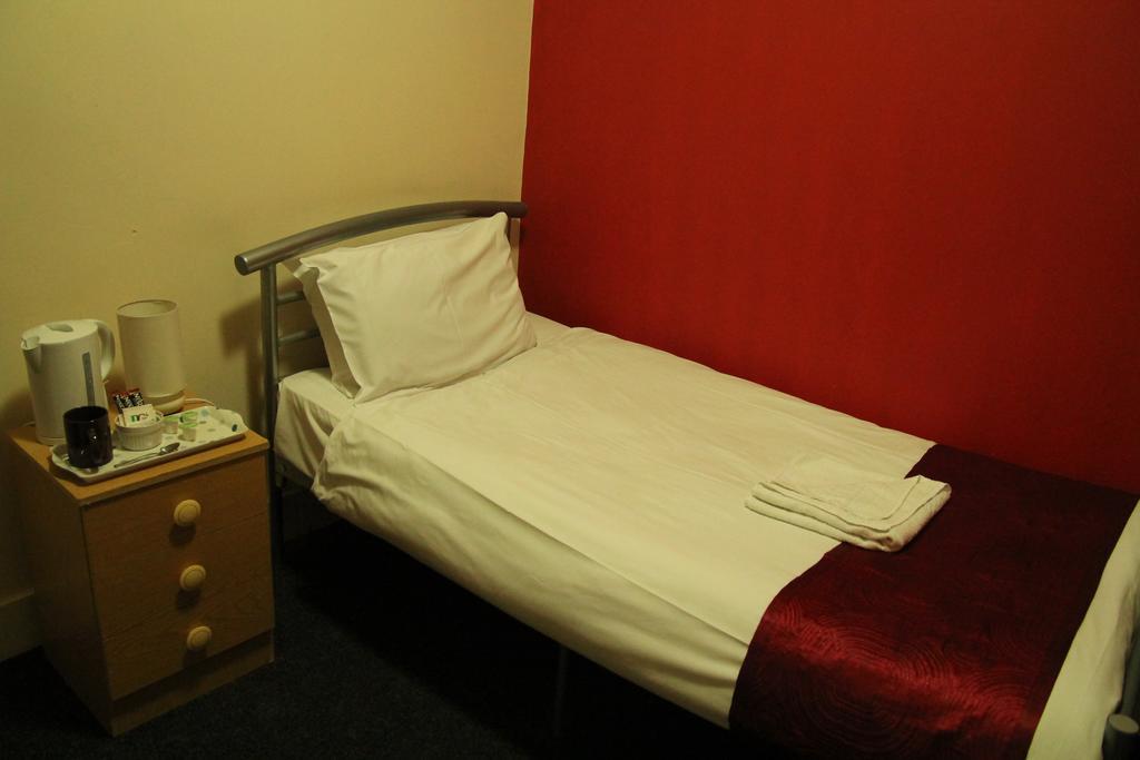 London Olympus Hotel Nirvana Quarto foto